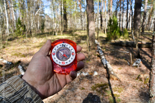 With the compass on a walk.