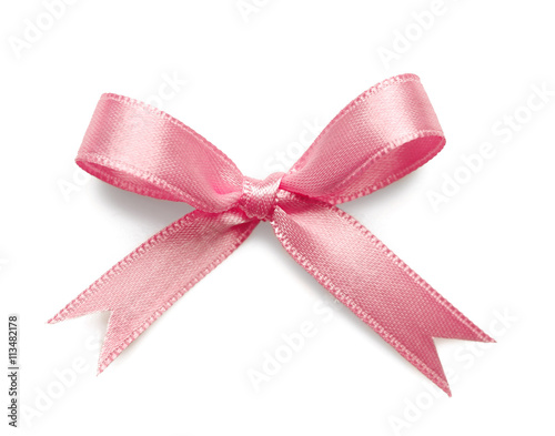 Pink ribbon bow on white background