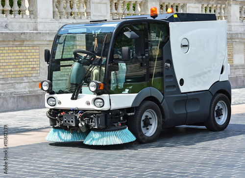 Street cleaner vehicle at work