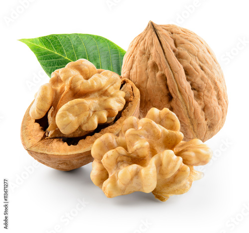 Walnuts with leaf isolated on white. With clipping path.