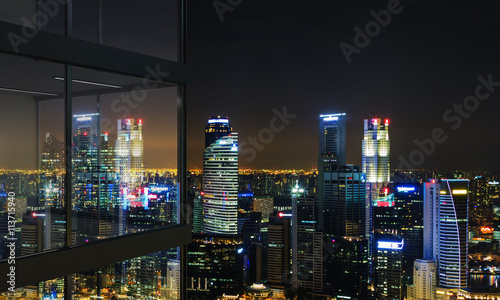 Balcony with illuminated Singapore view