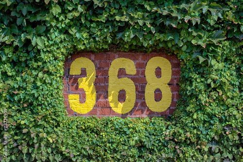 368 feet sign on the outfield wall of Wrigley Field in Chicago, Illinois