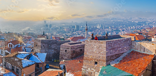 The sunset cityscape with the old rampart of Ankara Castle, Turkey