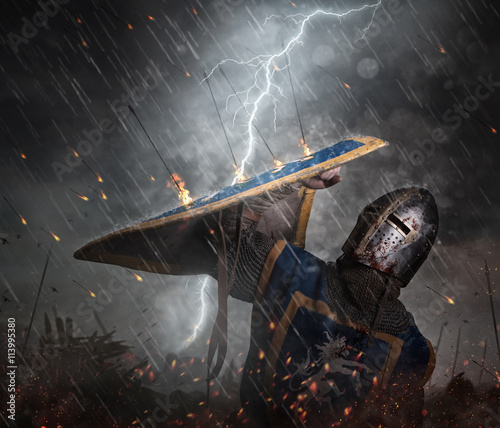 Lightning strikes a knight on battlefield.