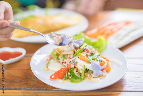 papaya and omelet egg salad - selective focus