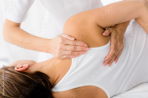 Woman receiving massage treatment