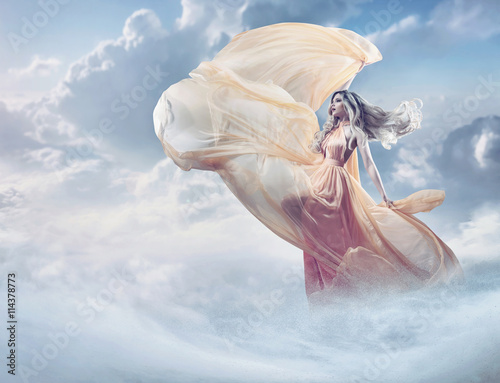 Fairy image of a beautiful young lady in the clouds