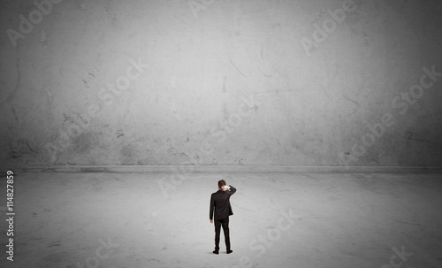Small business person in large empty space
