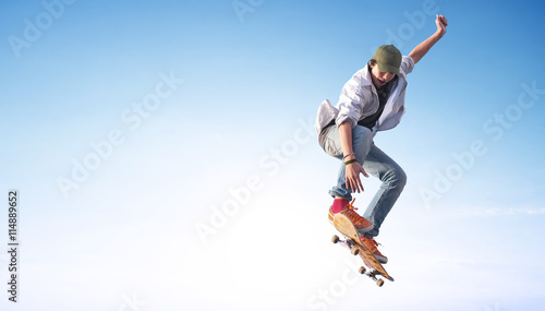 Skater on the sky background. Sport and active life concept