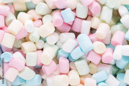 Background or texture of colorful mini marshmallows.