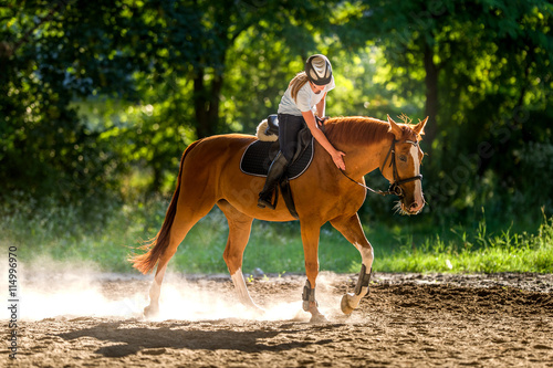 Girl riding a horse