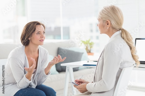 Woman talking with therapist