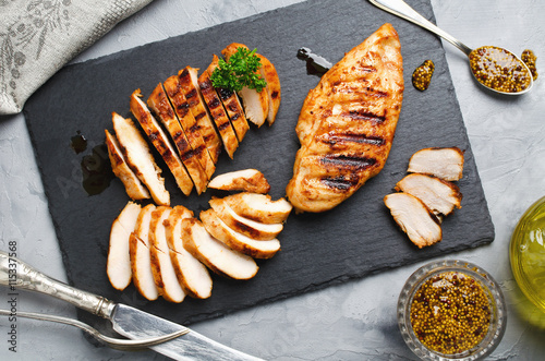 Grilled chicken fillets in a spicy marinade