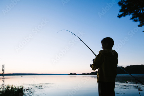 Boy fishing in the river