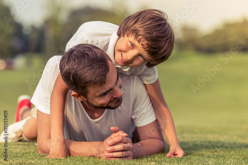 Dad and son resting outdoors