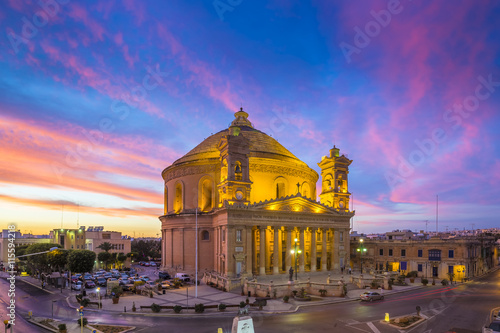Malta - The famous Mosta Dome with amazing colorful sky at sunset