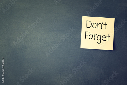 don't forget reminder, written on sticky memo