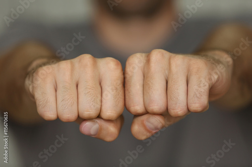 Man fists with space for tattoo