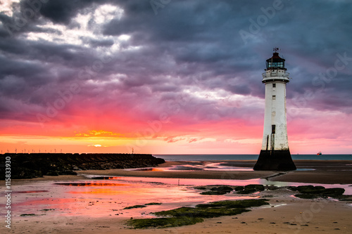 Perch Rock lighthouse at New Brighton near Liverpool at sunset.