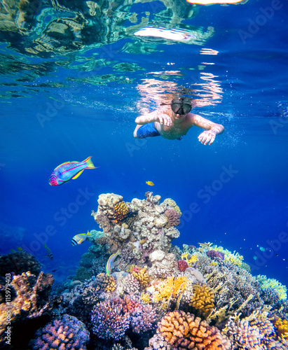 Underwater shoot of a young boy snorkeling in red sea