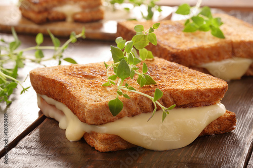 Fresh toast with cheese and herbs