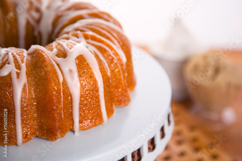 Close up of delicious bundt cake dessert sugar frosting homemade brown sugar ingredients
