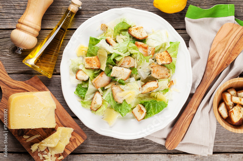 Fresh healthy caesar salad cooking