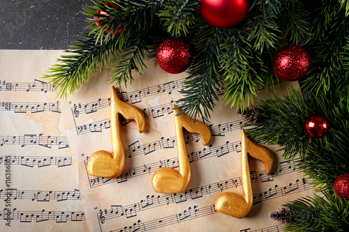 Christmas decorations on music sheets