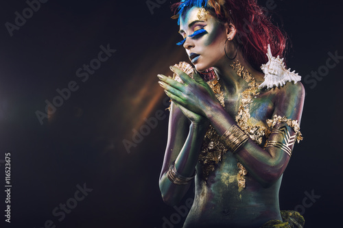 Beautiful young girl with body art in an fantasy style