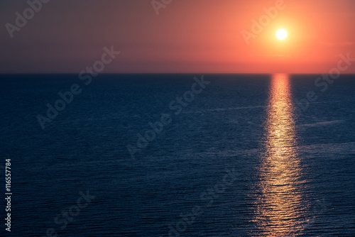 calm ocean at cloudless sunset