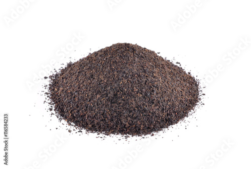 Small heap of Ceylonb lack tea on white background