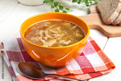 Traditional polish tripe soup with vegetables.