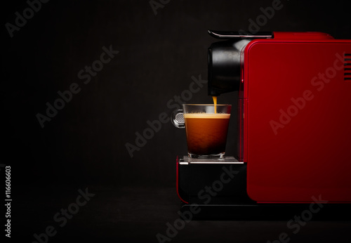 Coffee machine with cup of coffee