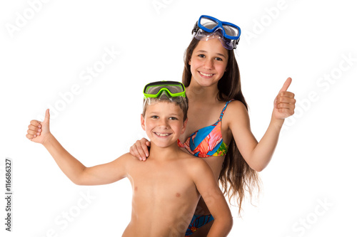 Two happy kids in diving mask standing together