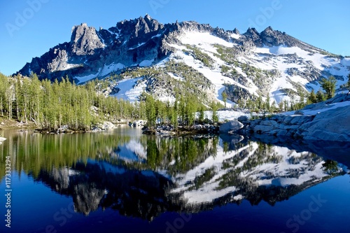 Reflection of mountain in alpine lake. Enchantment lakes basin near Leavenworth and Seattle, WA. 