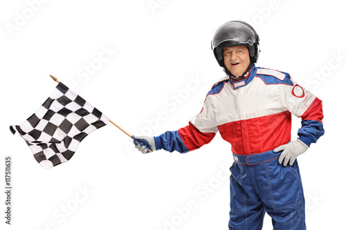 Race driver waving a checkered flag