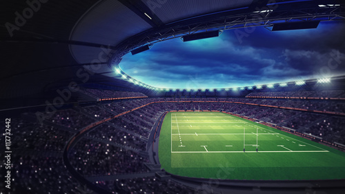 rugby stadium with fans under roof with spotlights