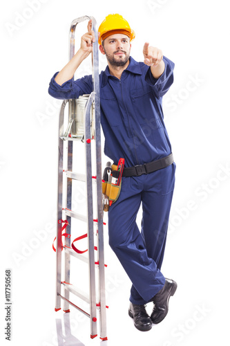 Worker standing pointing with aluminum stepladder, isolated on w