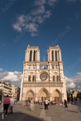 Notre Dame de Paris. France. Ancient catholic cathedral on the quay of a river Seine. Famous touristic architecture landmark in spring 