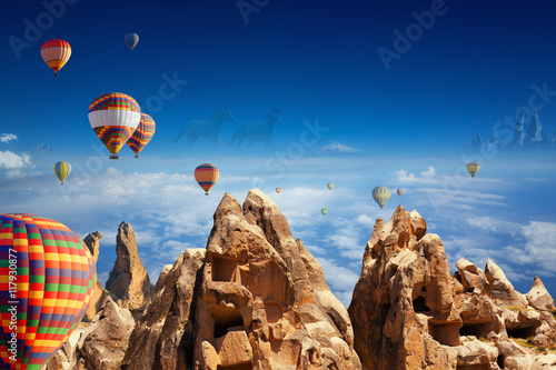 Hot air balloons, hand carved rooms in rocks, two running horses