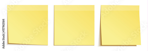 Yellow stick note isolated on white