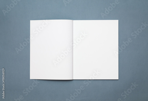 Blank open magazine isolated on grey background