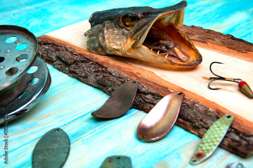 The composition of fishing lures, pike and old-fashioned reel