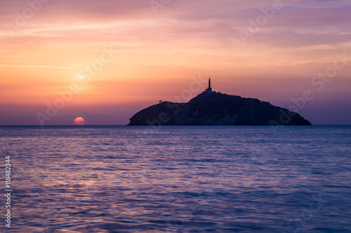 Sunset view of a lighthouse in an island - Santa Marta, Colombia
