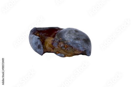 Isolated lose-up of ripe, smashed blueberry (side view)