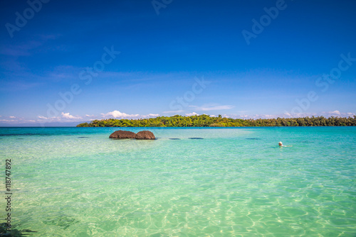Beautiful tropical island beach summer holiday in sunny day.