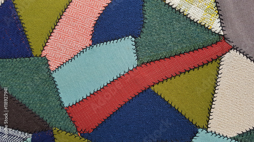 close up of upholstery crazy quilt pattern 