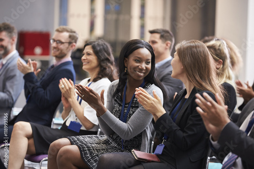 Audience Applauding Speaker After Conference Presentation