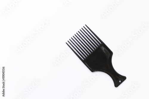 Black plastic design comb on white background