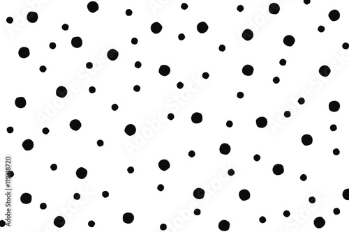 Hand drawn small and big circle. Polka dots in black and white